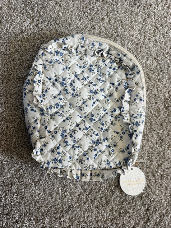 Altar'd State Handbags - Altar'd State Cream Quilted Pouch with Blue Floral Print